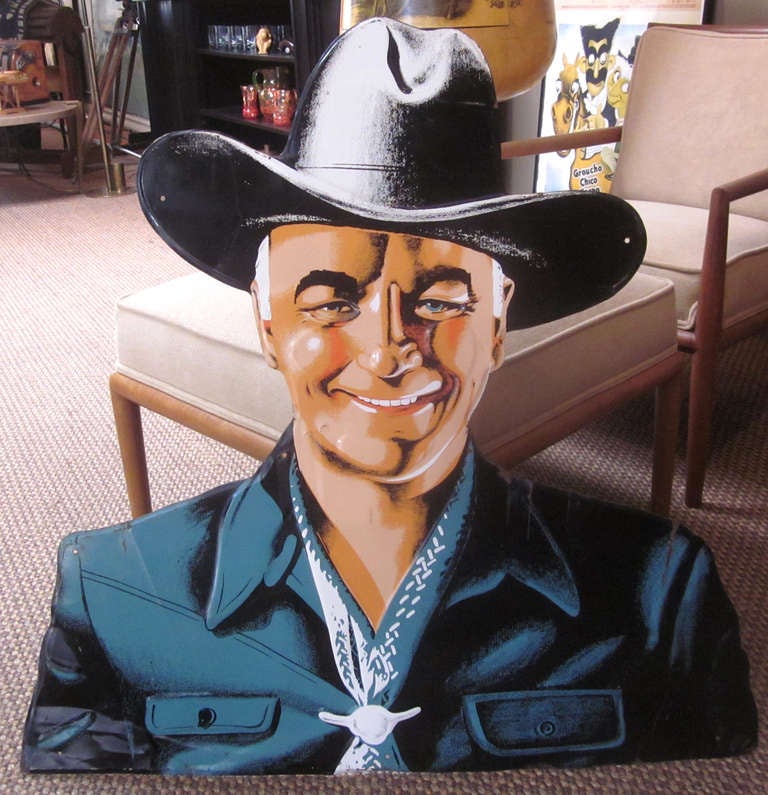 William Boyd, more commonly known as Hopalong Cassidy, was one of the most popular and memorable cowboys of America's post war years. He also was a marketing maven, licensing his name and image to countless products. This oversized lithographed tin