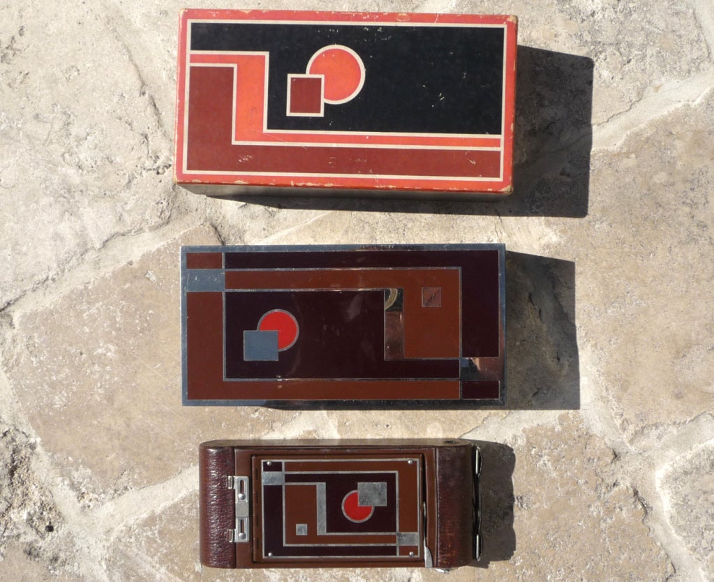 Employed by the Kodak Corporation in 1928, industrial designer Walter Dorwin Teague was to update the boxy cameras, and ultimately increase the appeal and sales. His designs of the period were bold and colorful, and had a great appeal. He designed