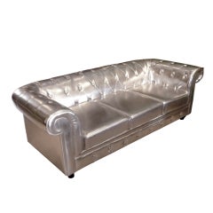 "Keeping Up with the Kardashians" Pair of Silver Sofas