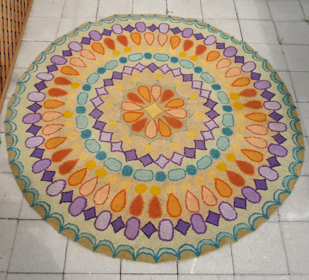 A fun rug with great colors, this patterned hook rug takes a long standing tradition and updates it. We have just had it cleaned, and it displays very well.