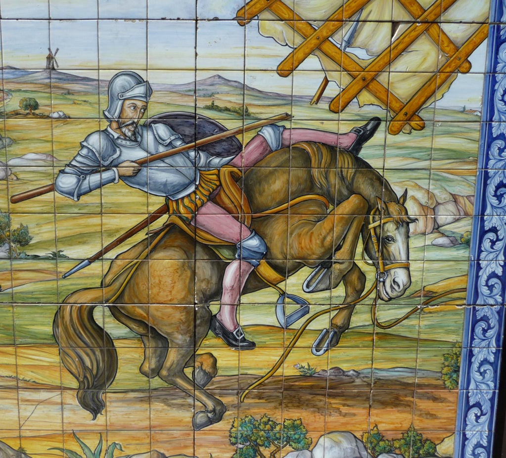The adventures of Don Quixote and his sidekick Sancho Panza are beautifully depicted in this amazing wall. The tiles are all hand painted by the Artesania Talaverana studios of Toledo, Spain. The tiles were once mounted, and have been removed