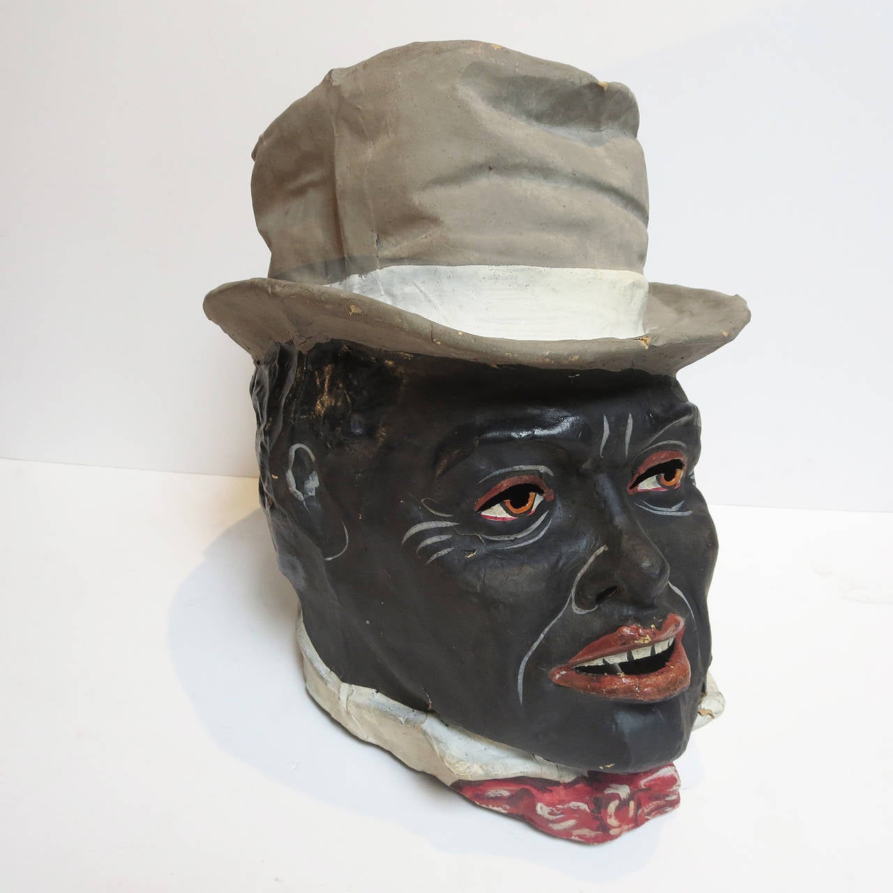 Mr. Bojangles himself! This wonderfully charming costume includes a head, two hands, and two bare feet. All items are made in painted papier mâché, and are in nice original condition. The head and hands slip over yours, while the feet would clip