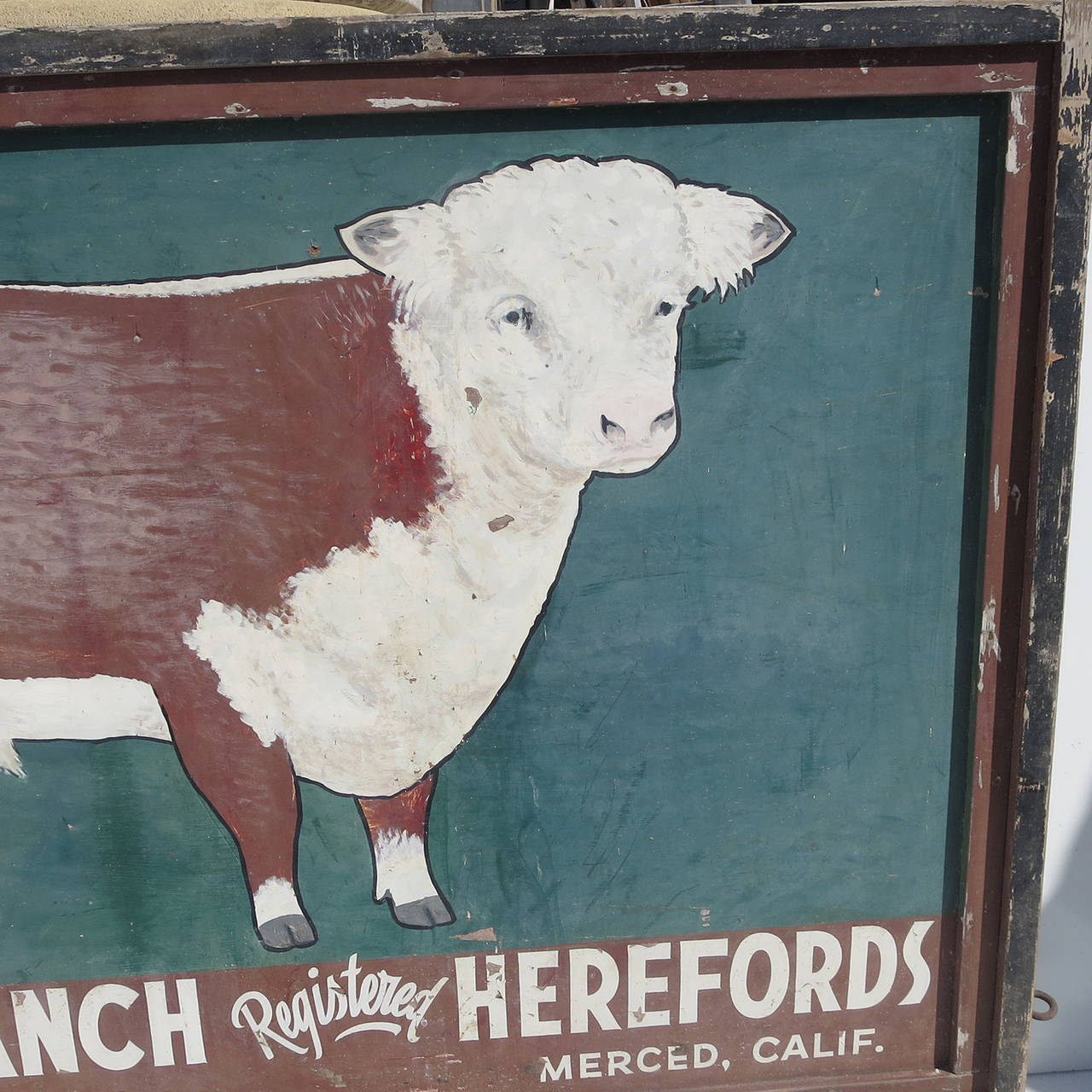 Charm abounds in this great Hereford sign, painted for the Helm Ranch of Merced, California. The sign is double-sided, painted on both sides. The 