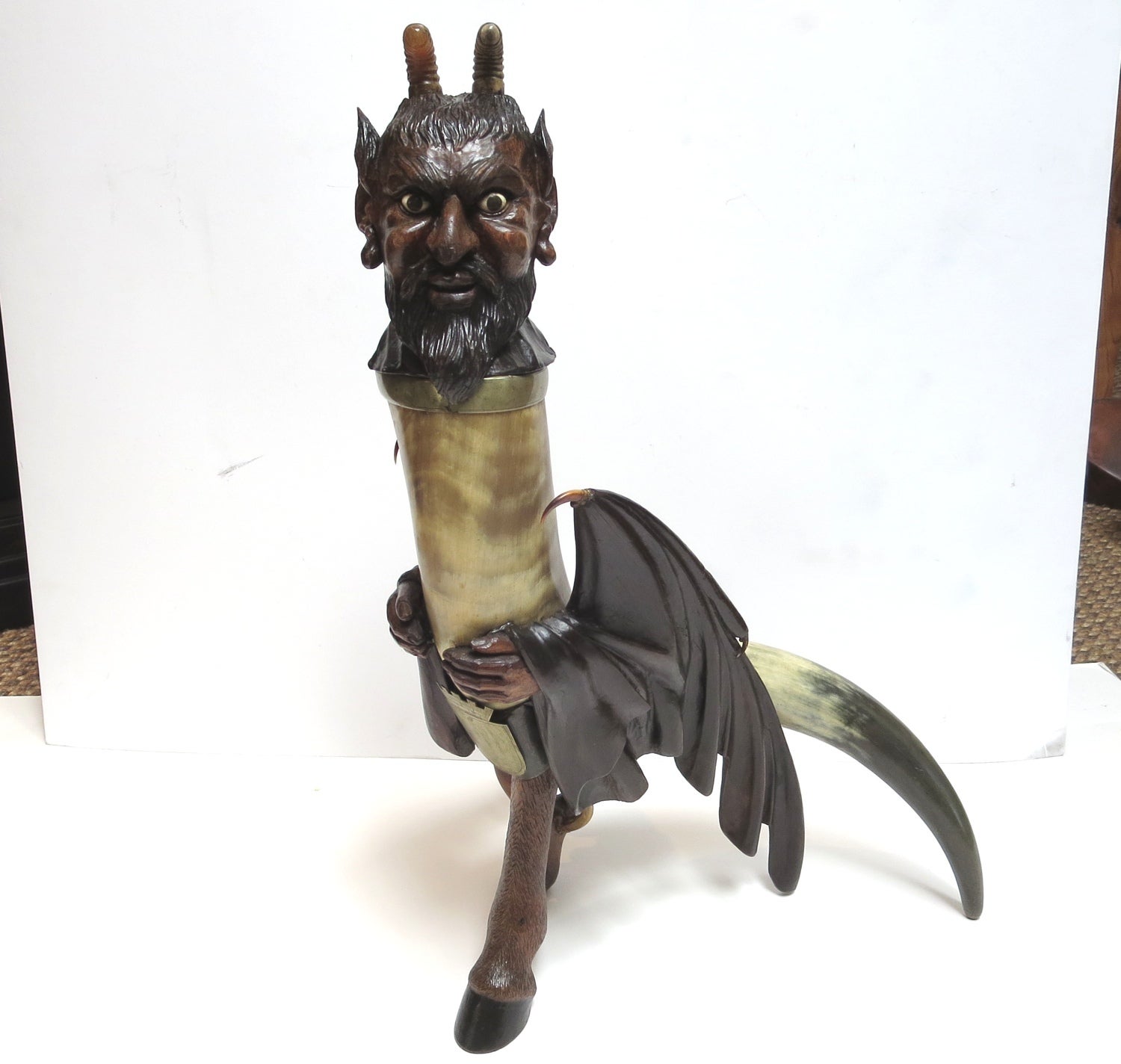 Elaborately Carved Devil Horn Flagon