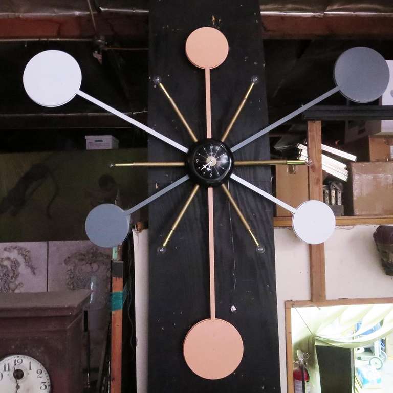 With a nod to George Nelson, this fantastic sculptural clock takes the design to extremes. With a seven foot diameter, it certainly makes a timely statement! The clock was made by Spartus, a mid-century American company. The six 