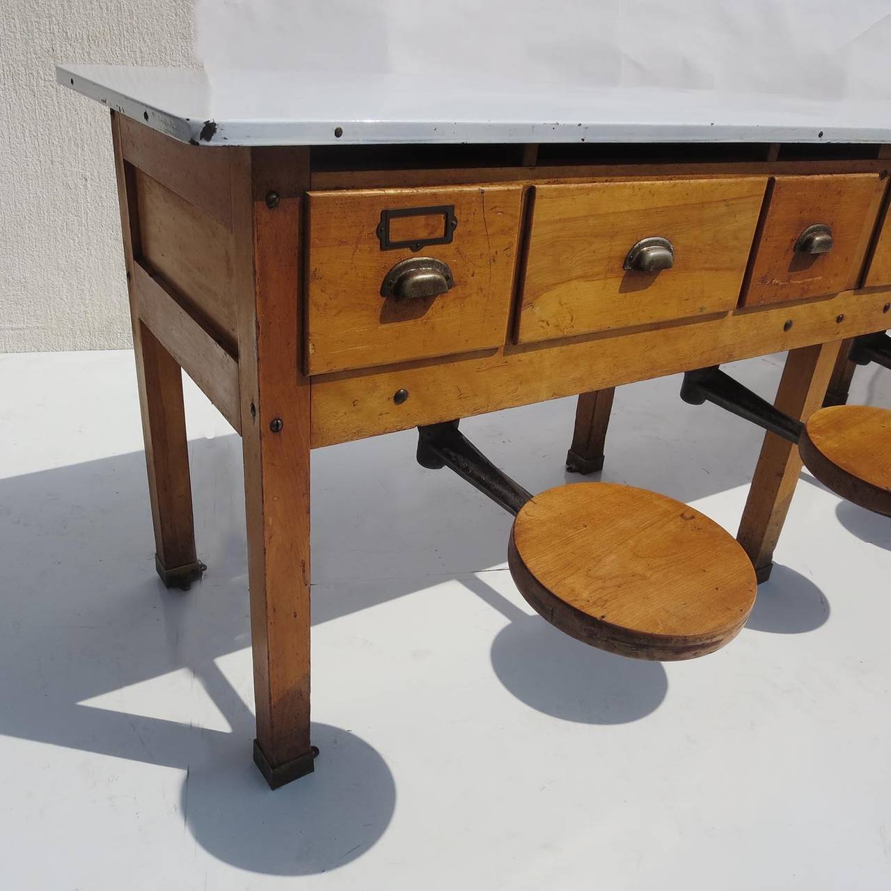 Cast Early 20th Century Institutional Work Table with Pull-Out Seats