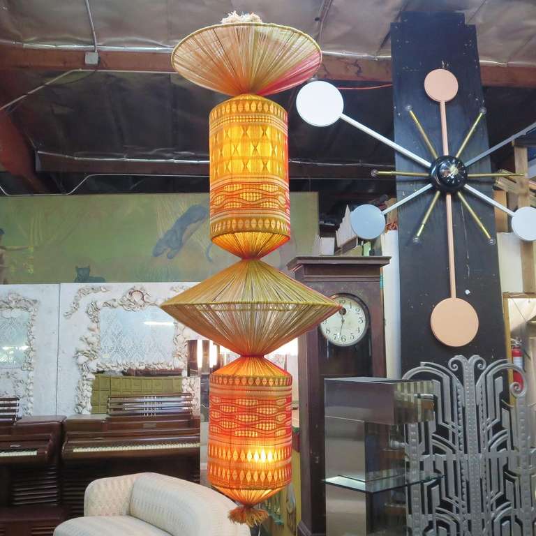 From the Pasadena show CA Design 11 in 1971, comes this extremely rare lamp sculpture weaving by Jacquetta Nisbit. At over seven feet tall, the sculpture is double woven of fine wool yarns. The column is equally impressive lit or unlit, and is in
