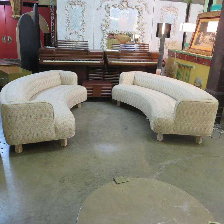 Created for a Southern California residence in 1977, this sweeping pair compliment each other with style and grace. Both are in original period fabric, and are in very nice condition. Reupholstery can be offered at an additional cost.