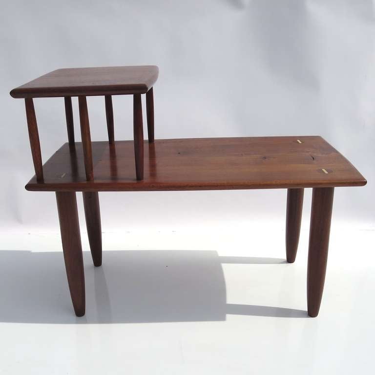 RETIREMENT SALE!!!  EVERYTHING MUST GO - CHECK OUT OUR OTHER ITEMS.				

These lovely tables were created by the California master woodworker Sam Maloof. The elegant forms were executed in solid walnut, and freshly polished. The legs pierce the