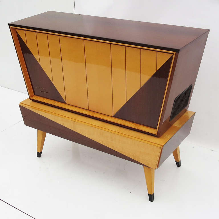 One of the most fantastic post war designs to emerge from Germany was the Kuba Tango cabinet. Originally a furniture maker, Kuba began to create cabinets for home audio components, and later, televisions. They purchased the Imperial audio line, and