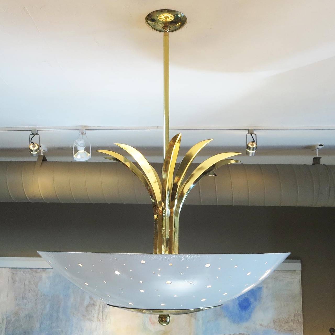 This superbly stylish chandelier has been restored, including all new sockets and wiring. All brass elements have been re-plated, and the perforated bowl shades have been powder coated in a lovely cream gloss finish. There are some minor areas of