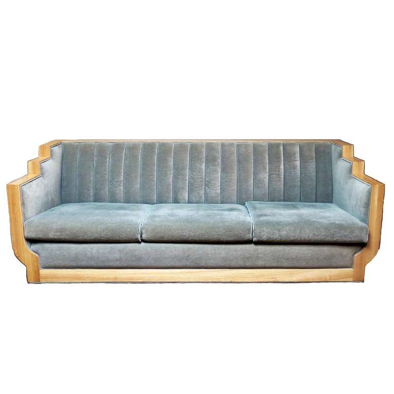 This fantastic sofa set was created by Jazz, a Los Angeles based furniture design firm of the 1990's. Based in the prestigious Pacific Design Center, Jazz produced very fine quality Art Deco Revival furnishings. This three piece set was finished in
