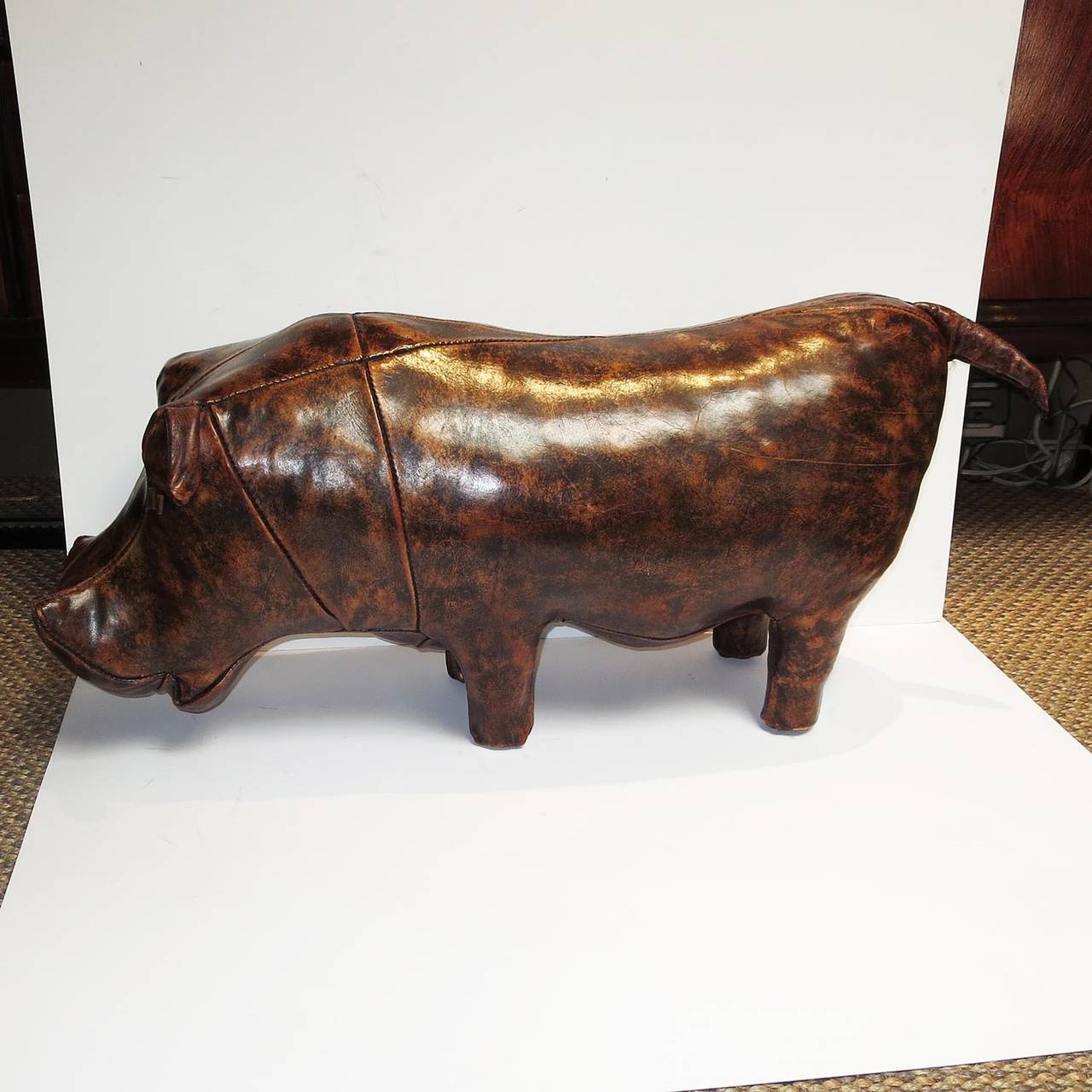 This lovely hippo was custom created as a footstool for the Abercrombie & Fitch stores in the 1960s. The stitched panels are heavy pigskin leather, and the overall condition is one of the best we have seen. It is stamped in the ear 