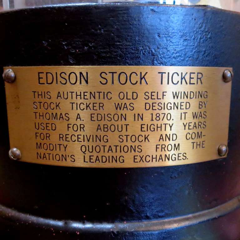 Invented in the 1870's, the ticker tape machine was the first invention by Thomas Edison, and helped him finance his many later creations. An electrical impulse fed into the unit, and the 