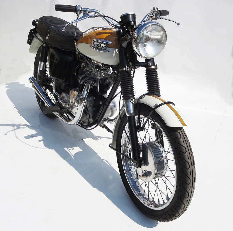 This beautiful Triumph was purchased from the original owner, and pulled apart for restoration. Over the course of two years, the entire engine and transmission was rebuilt, the chrome was replated, the frame was powder coated, the seat