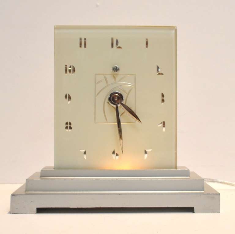 The classic example of 1930's streamline design, this very desirable clock is in excellent physical and working condition. Paint is original without flakes or chips. The clock runs quietly and keeps excellent time.