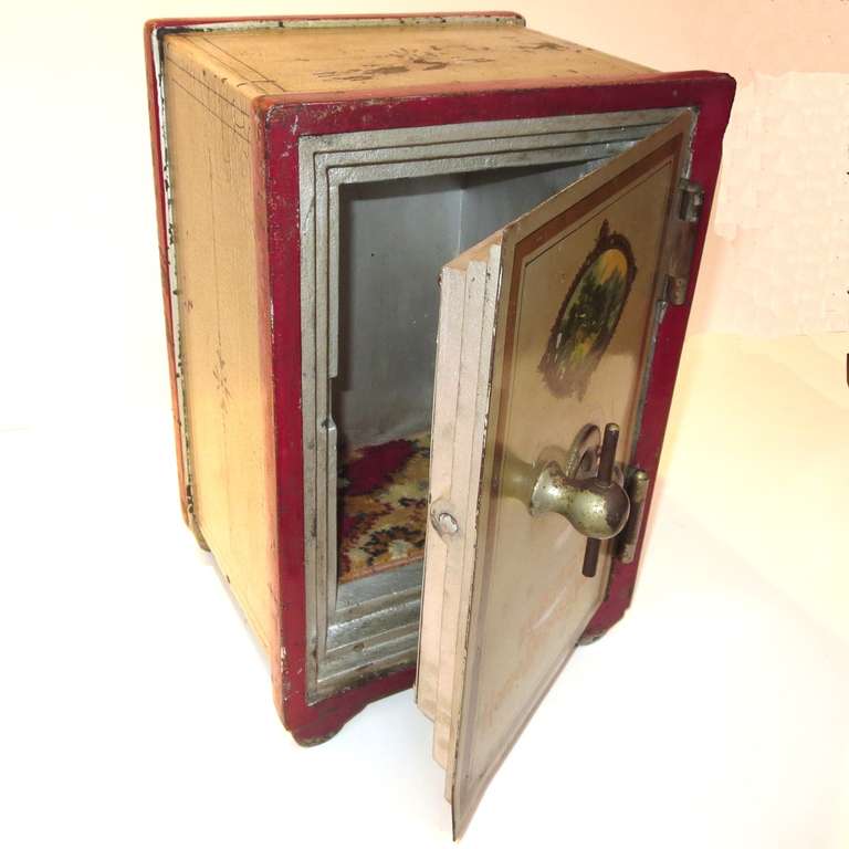 Don't let the size fool you. This miniature marvel weighs in at an impressive forty seven pounds! This charming security box was designed for home use, and was a practical way to safely store documents or jewelry. Ours retains an impressive