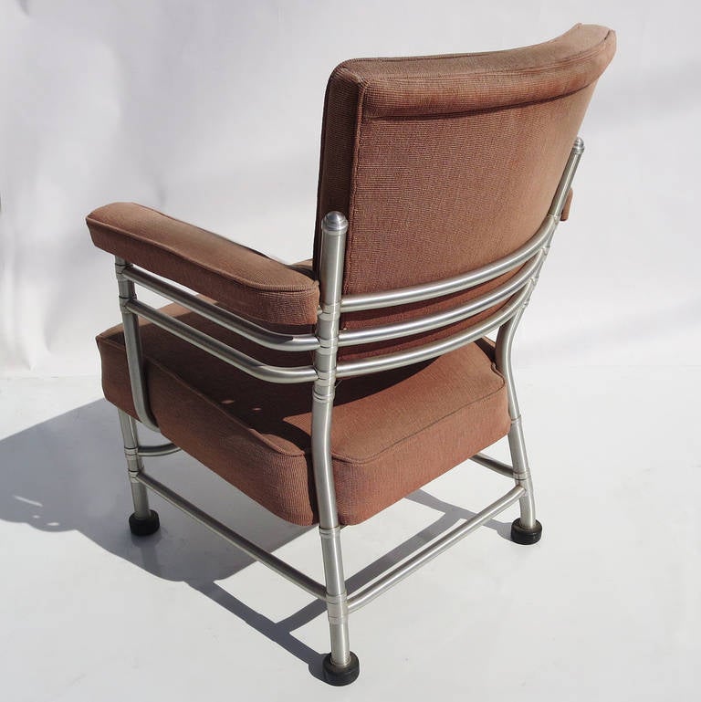 A classic design from one of America's Modernist masters. This Warren McArthur chair displays all the hallmarks of his timeless forms. All the tubes of satin finished aluminum are joined by decorative 