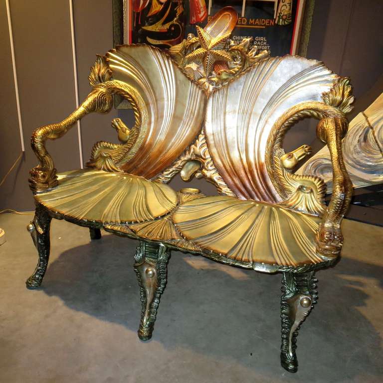 This remarkable design is hand carved wood, gilded in silver leaf and applied stains. The bench is in fantastic condition, having been restored some time back. The construction is solid, with no  cracking or damage to the woods or finish. The