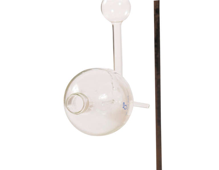 Blown glass beaker on plated cast iron stand. Sold individually.