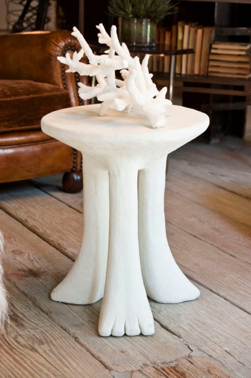 Original “African Table,” by Dickinson. Three legged side table in concrete plaster.