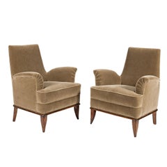 Pair of Club Chairs in the style of Jean-Michel Frank