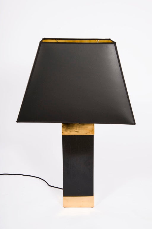 Solid white oak ebonized with cast bronze top and bass in gold patina. Lampshade included. Custom options available.