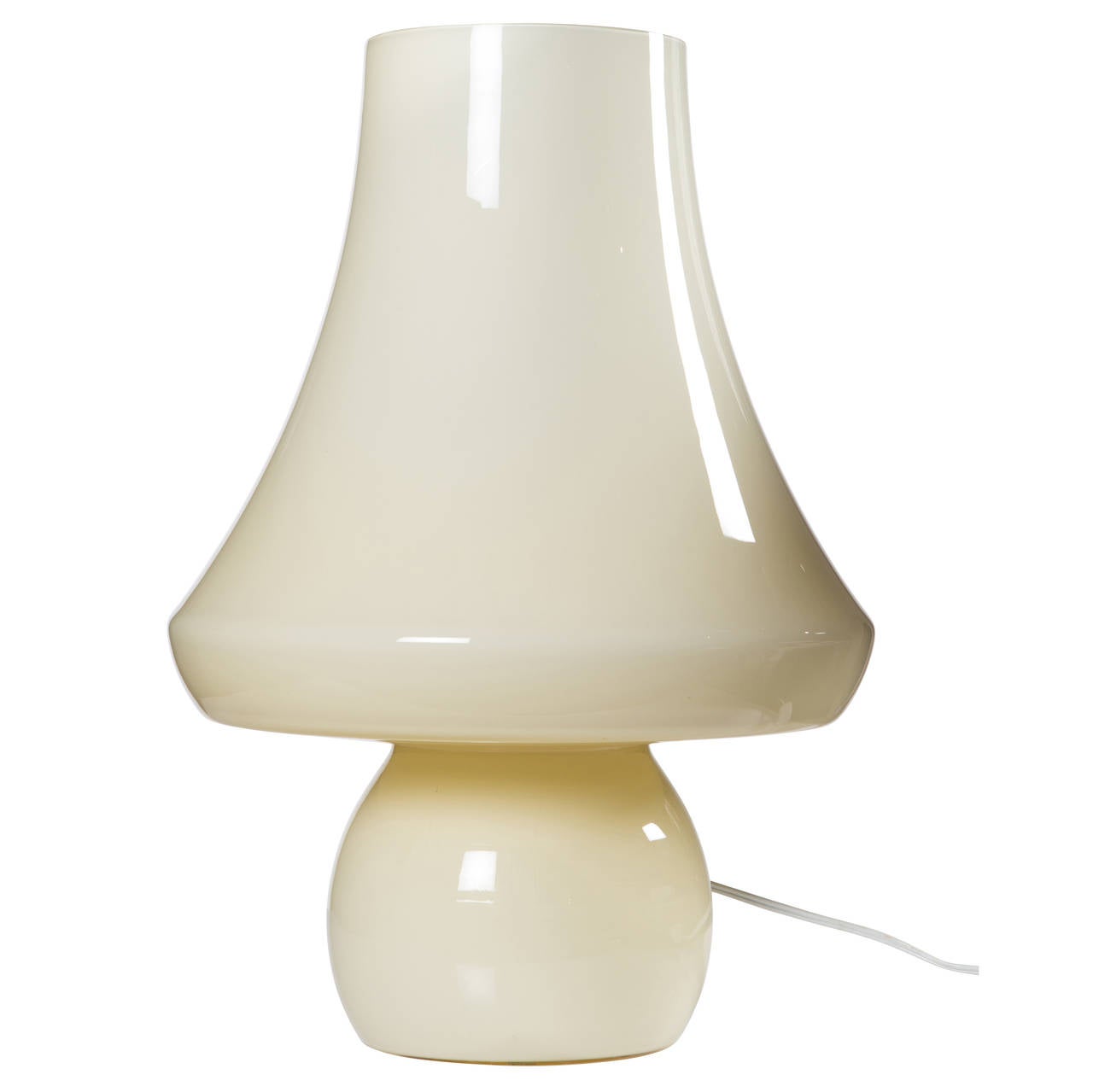 Pair of off-white glass table lamps, single form with no seams.
