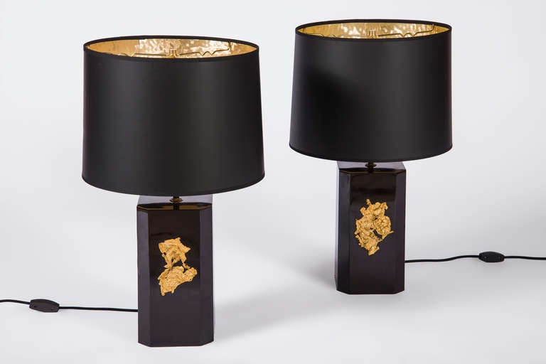 Pair of noir lucite hexagonal table lamps with 24k gold flakes on face. Priced per pair. Shades sold separately.

All Sales Final - No Additional Discount