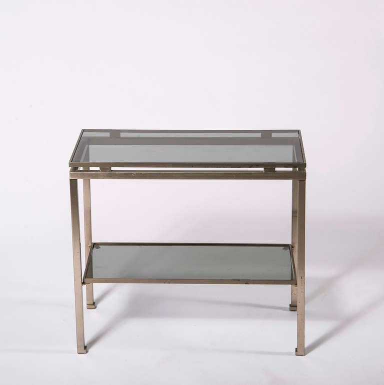 Pair of rectangular side tables with raised inset glass tray top on chow legs.

All Sales Final - No Additional Discount