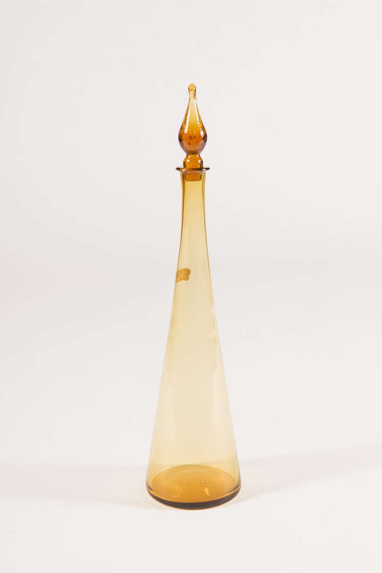 Colored glass decanter with top finial stopper. Individually Priced.

* BELOW IS WHAT IS STILL AVAILABLE*
Purple, no topper
Yellow with ripple texture and topper
Yellow with smooth surface- shown with topper but it has sadly broken since then.