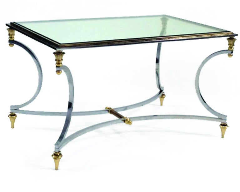 Steel and brass cocktail table.