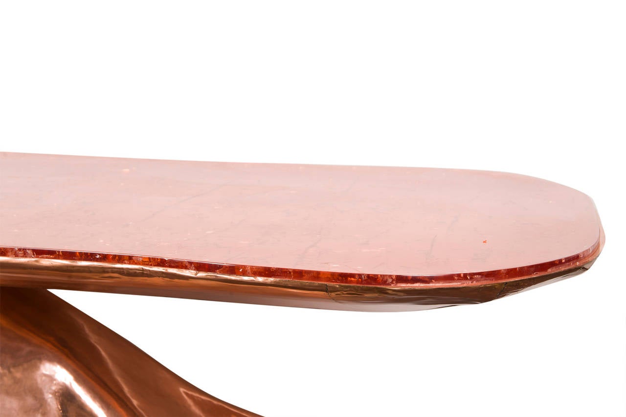 Copper dining table by Sylvan.