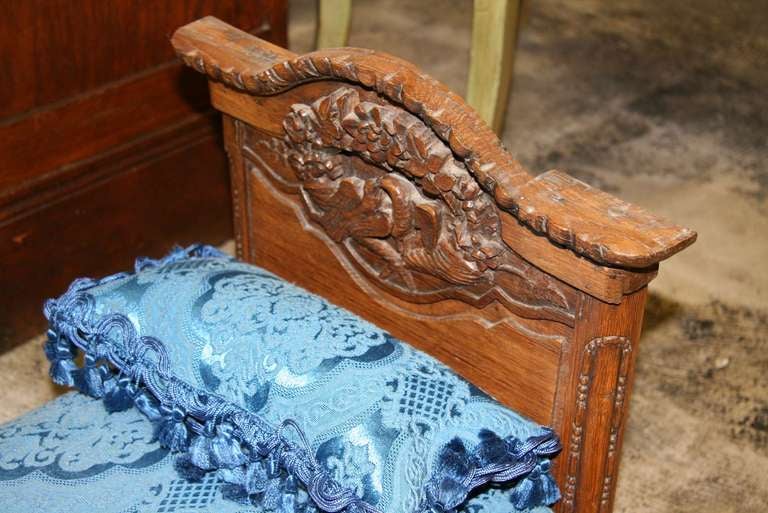 Fabulous Rare Late18th century Normandy French chestnut or oak  doll bed vintage fabric.
Deep handcarved.Motif  wedding trophe's.