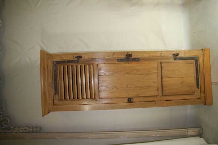 18th Century French Shutter Made into Bonnetiere also cabinet, bonnettier, storage piece<br />
