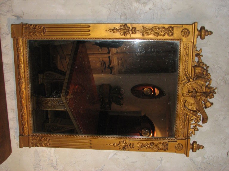 19th century French carved wood mirror with musical trophe'.