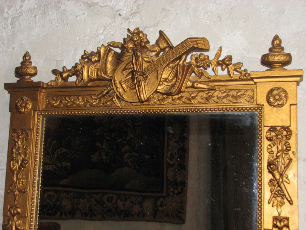 Rococo 19th Century French Carved Wood Mirror with Musical Trophe'