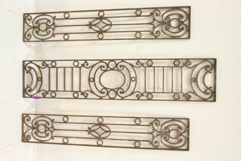 19th century wrought iron pieces.
One at 68'' x 14''.
Two smaller iron pieces have sold.