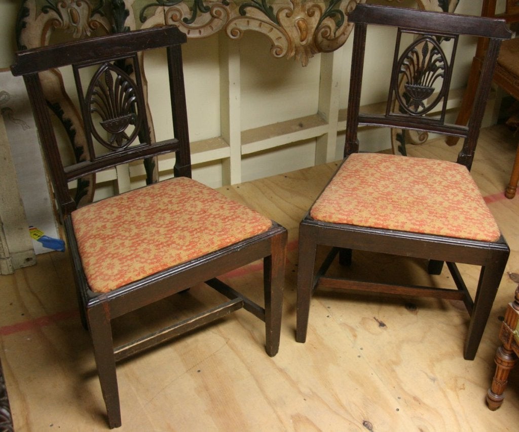 Two 18th century handcrafted French oak chairs upholstered.
 Measures: One at 32'' H x 20'' W 15'' D.
 Second one at 33'' H x 20'' W x 15'' D.
  