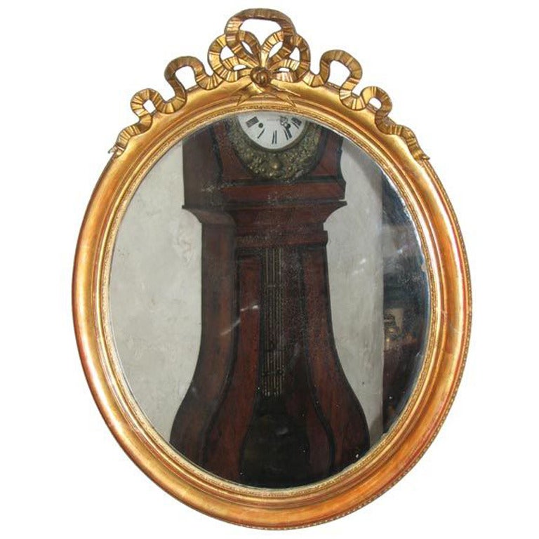 19th Century French Gold Doré Mirror with Carved Bow