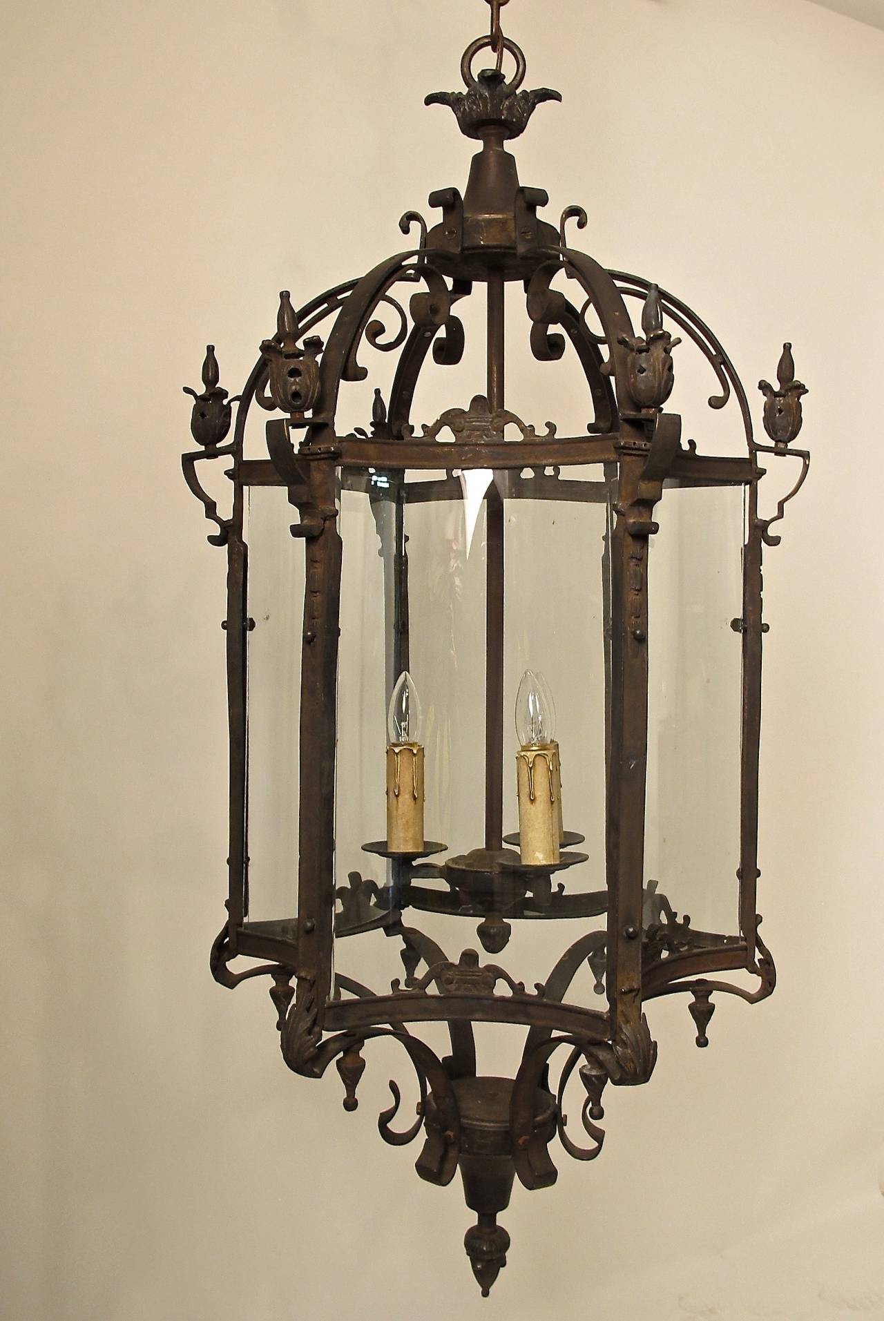 High quality bronze lantern with curved glass panels, bronze chain and canopy. Reconditioned and newly re-wired. The measured drop including chain is 87 inches, can be shortened if desired. European, mid 19th century.
