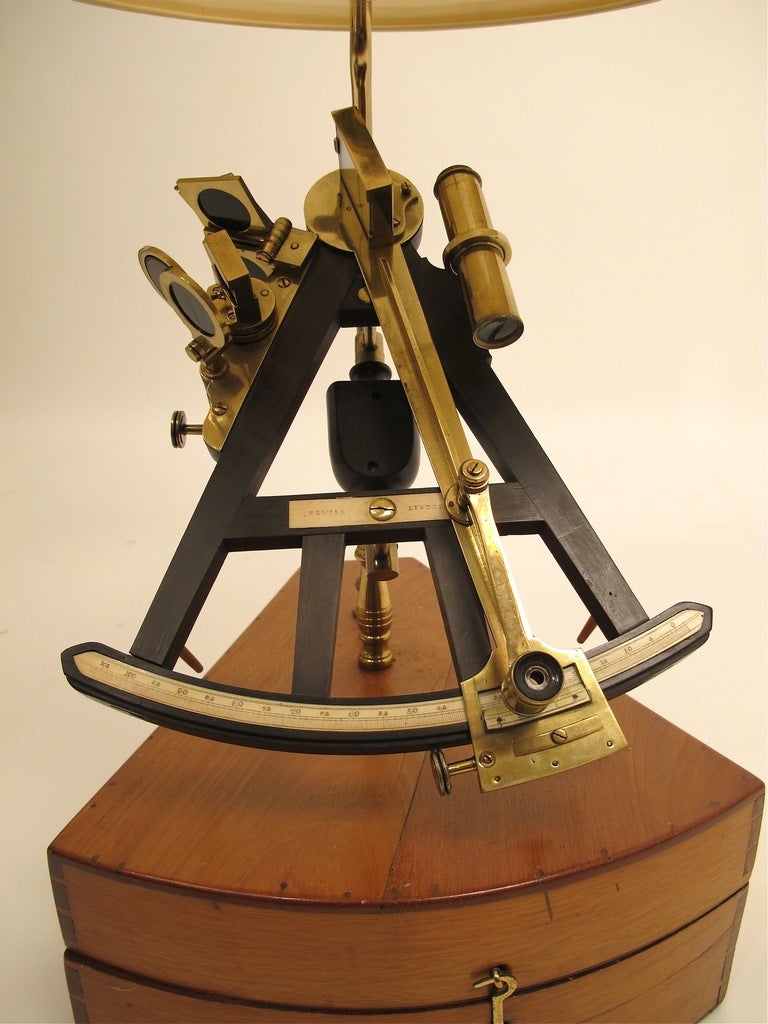 A Sewill and Liverpool octant with original box, expertly converted to a lamp. Brass and ebony with ivory detail.
Shade not included with lamp. Measurements do no include the lamp shade.