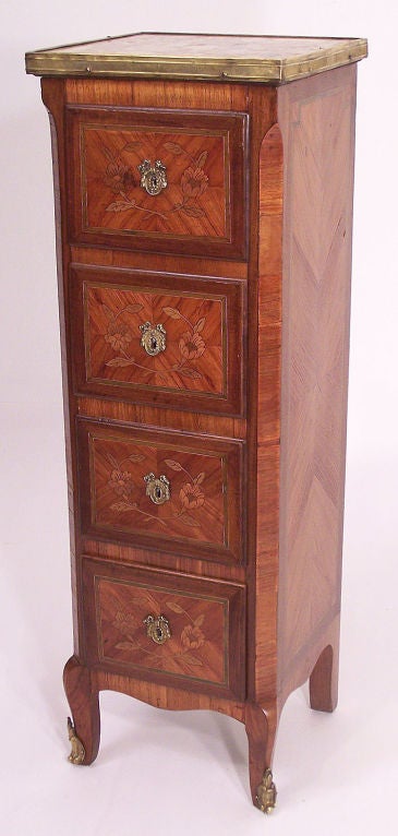 Highly unusual small chest with four drawers, probably custom made. Fruitwood veneers over oak with bronze mounts and marble top.