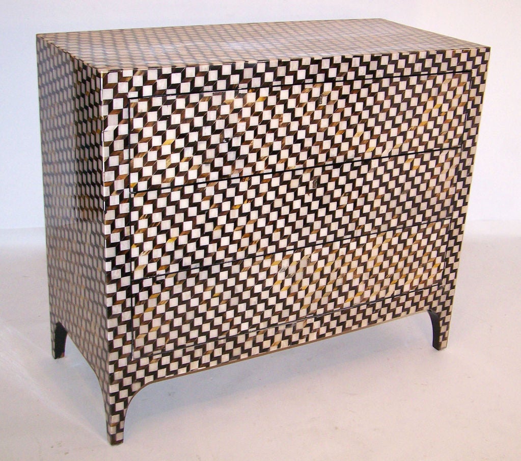 Highly unusual bone and horn parquetry veneer three drawer chest in an all over tumbling block pattern. Made in the last quarter of the 20th century.