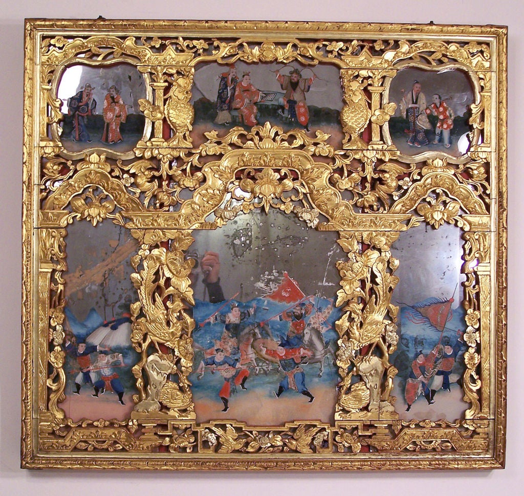 Reverse painted mirror in elaborately carved, painted and gilt wood frame. Original mirror and has original back. China, early to mid 19th century.