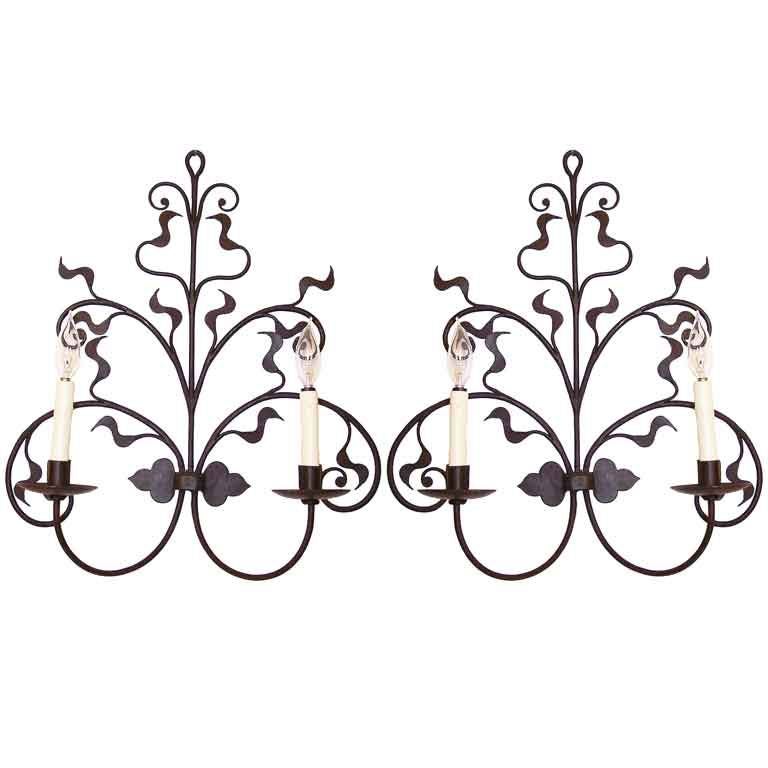 A Pair of Wrought Iron Sconces