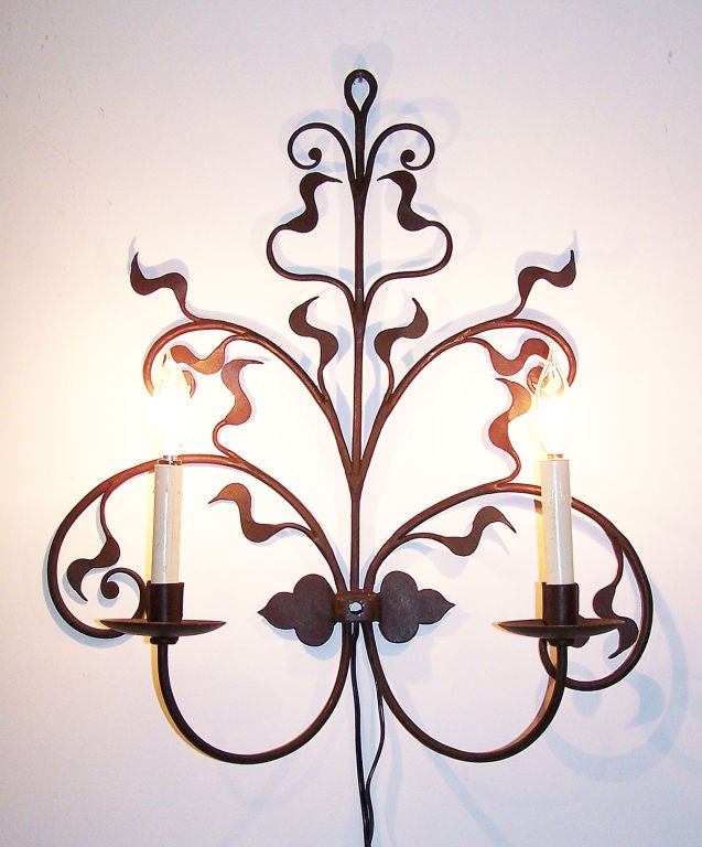 A Pair of Wrought Iron Sconces In Excellent Condition In San Francisco, CA