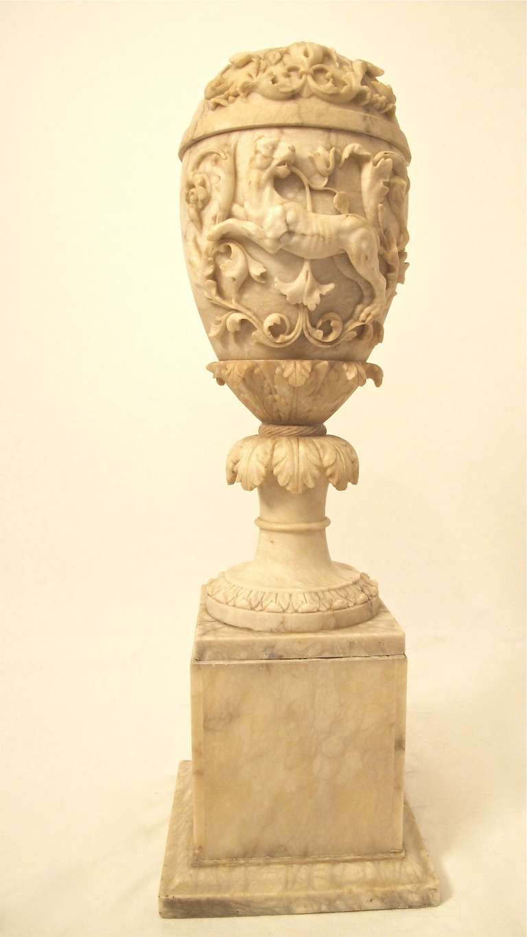 Tall and impressive alabaster urn with elaborately carved design and detail, Italy, 19th century.