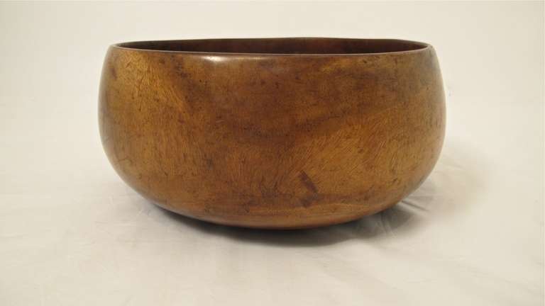 A rare 19th century hand carved Kou wood bowl. 
Kou wood was used because of its workability and fine grain. It did not impart a bad taste to food as did some of the other woods, such as koa. Kou wood bowls were usually reserved for the ali'i