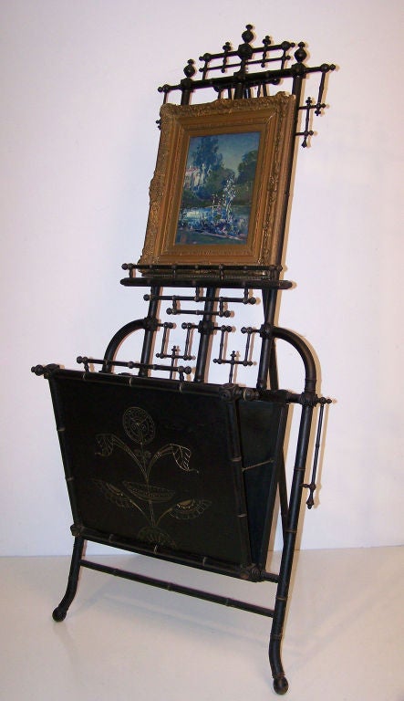 Victorian era ebonized painting easel with folio. American, late 19th century.